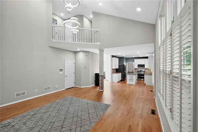 a view of a livingroom with wooden floor