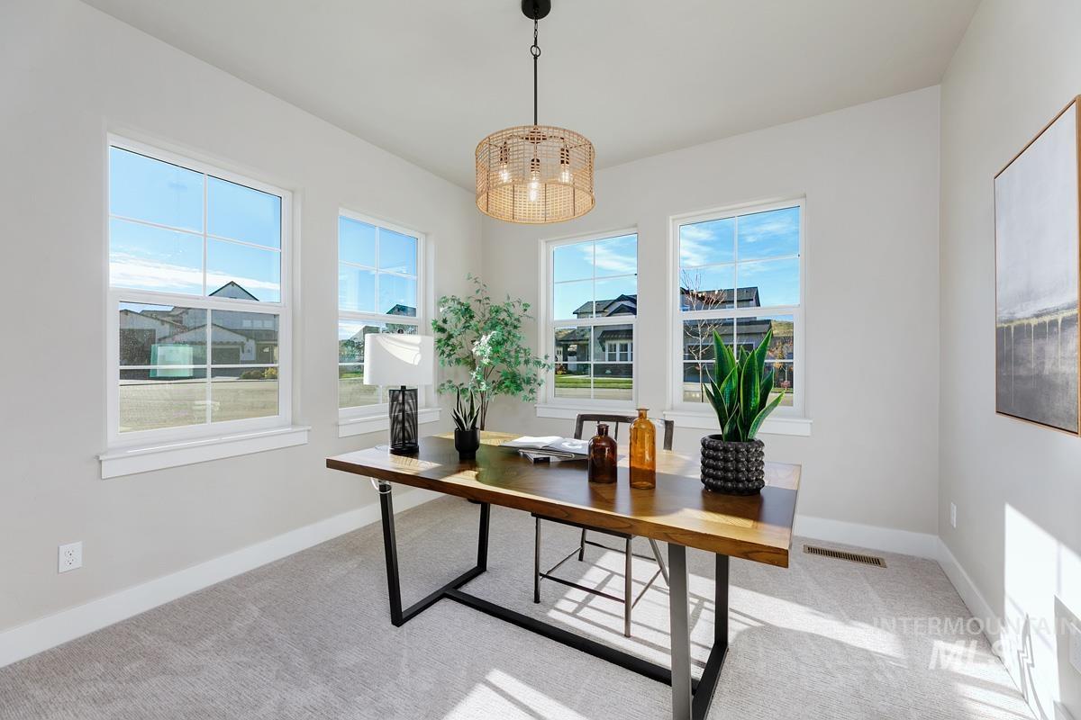 13544 North Ruffed Grouse Way Boise, ID 83714 - Photo 11 of 44 Office space featuring light colored carpet and a chandelier
