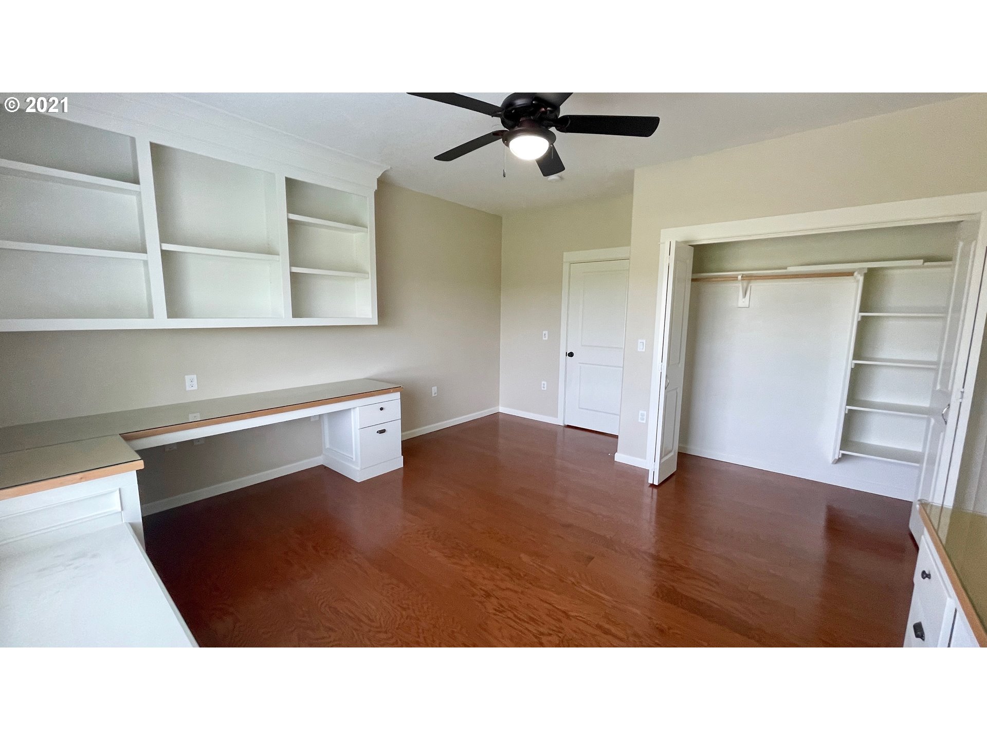 8765 Southwest River Road Hillsboro, OR 97123 - Photo 19 of 31 a black and white room with wooden floor