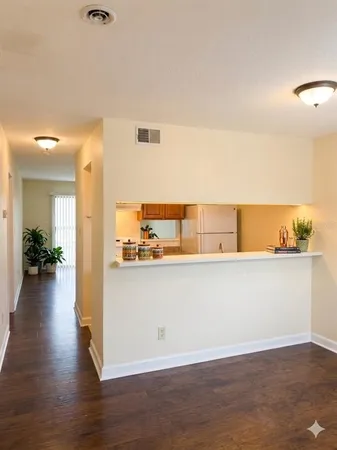 a view of workspace with wooden floor