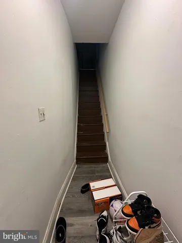 a kitchen with stainless steel appliances a sink stove and cabinets