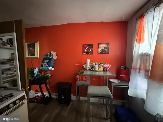 a bedroom with furniture and a chandelier