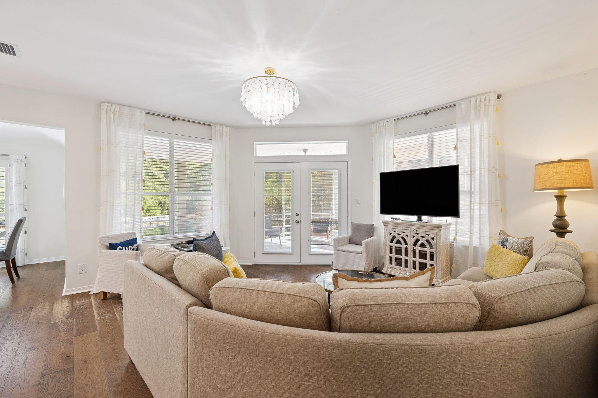 8855 Baypine Drive Miramar Beach, FL 32550 - Photo 16 of 49 a living room with furniture and a flat screen tv