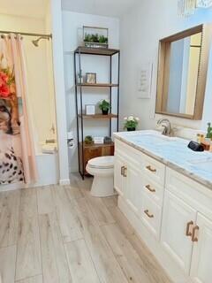 8855 Baypine Drive Miramar Beach, FL 32550 - Photo 22 of 49 a spacious bathroom with a double vanity sink a mirror and a shower