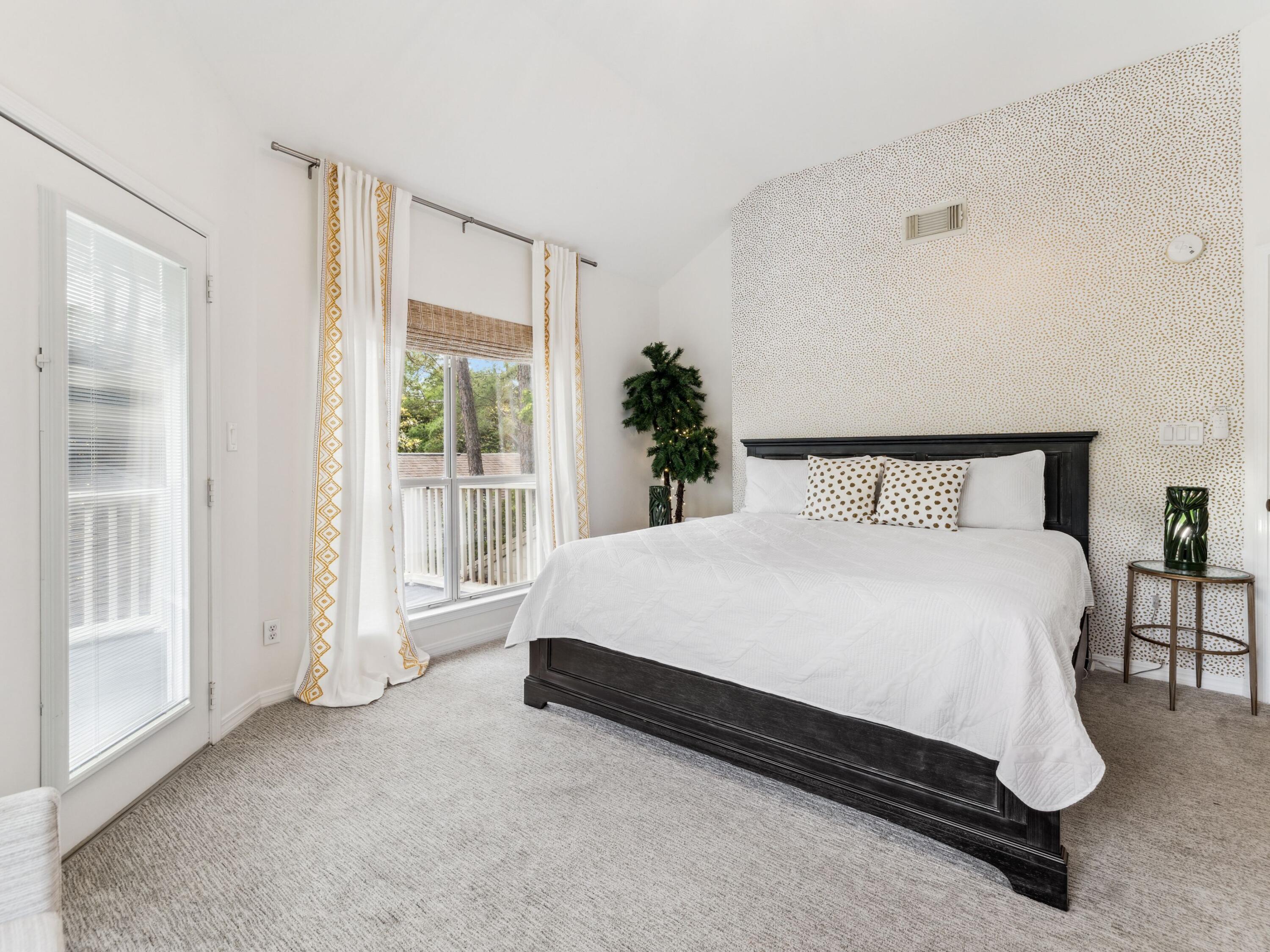 8855 Baypine Drive Miramar Beach, FL 32550 - Photo 35 of 49 a spacious bedroom with a bed and a window