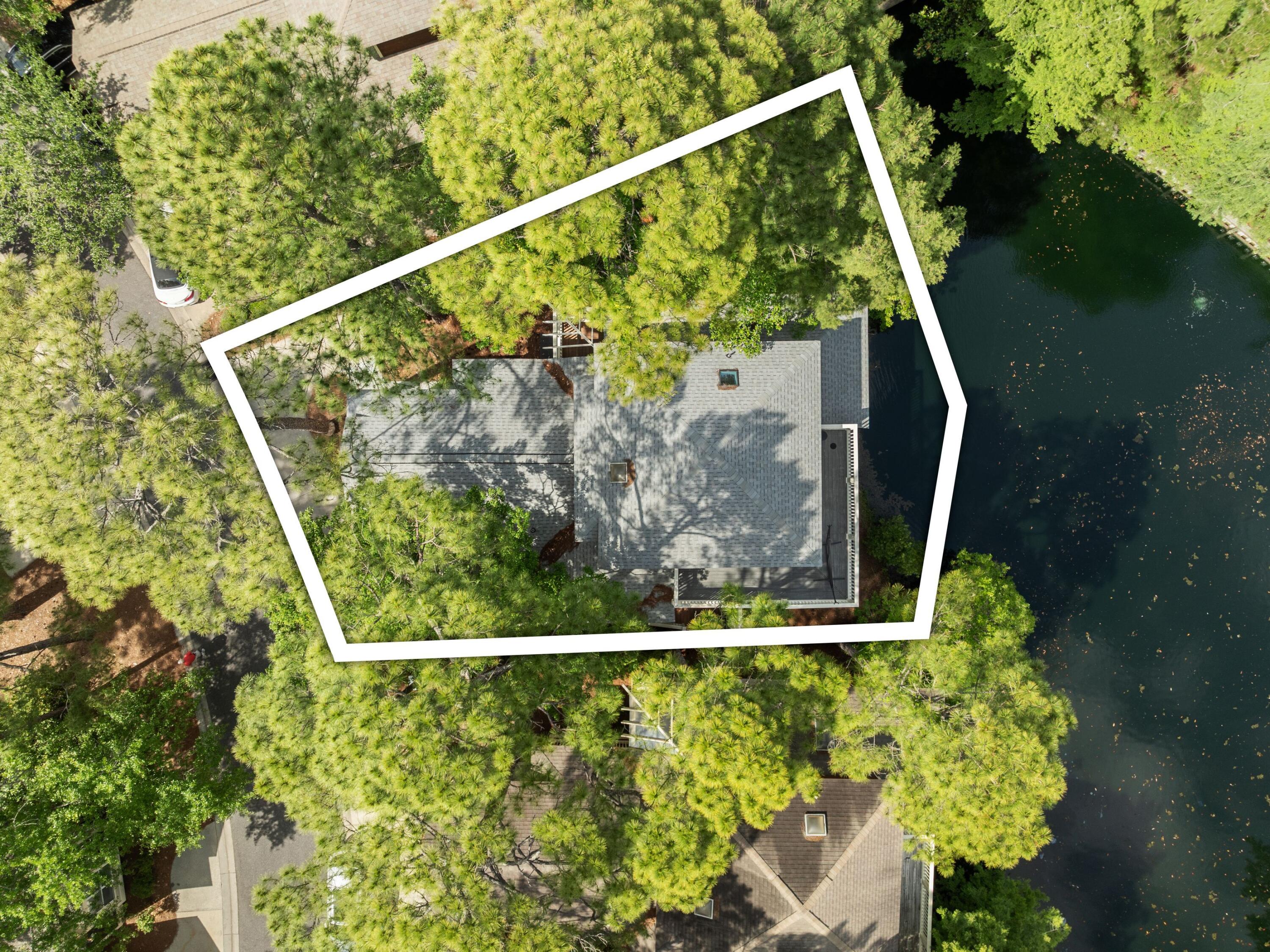 8855 Baypine Drive Miramar Beach, FL 32550 - Photo 8 of 49 a view of a small yard