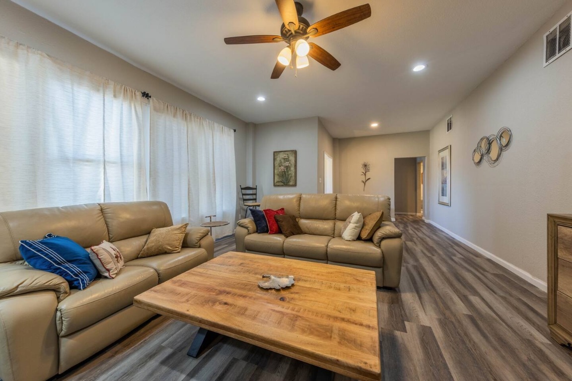 1212 North Main Street Elgin, TX 78621 - Photo 3 of 31 Living room featuring wood finished floors, recessed lighting, and ceiling fan