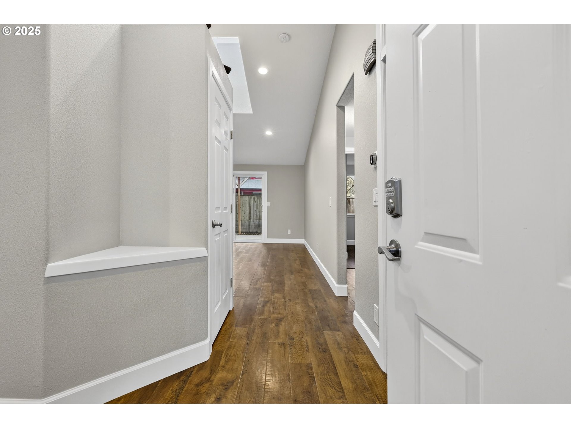 5118 Northeast Jarrett Street Portland, OR 97218 - Photo 12 of 46 a view of hallway with wooden floor
