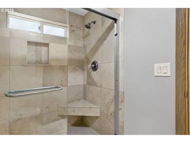 a bathroom with a sink and a shower