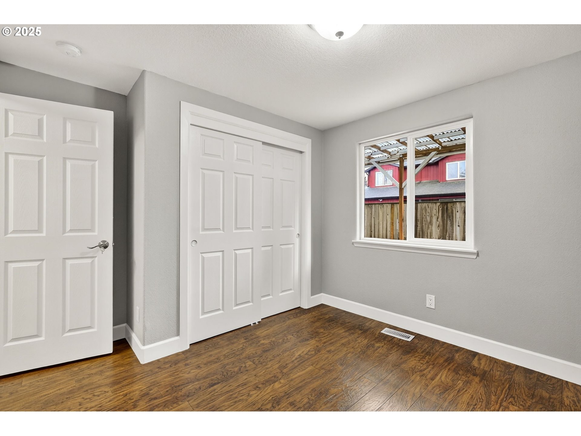 5118 Northeast Jarrett Street Portland, OR 97218 - Photo 33 of 46 a view of an empty room with glass door