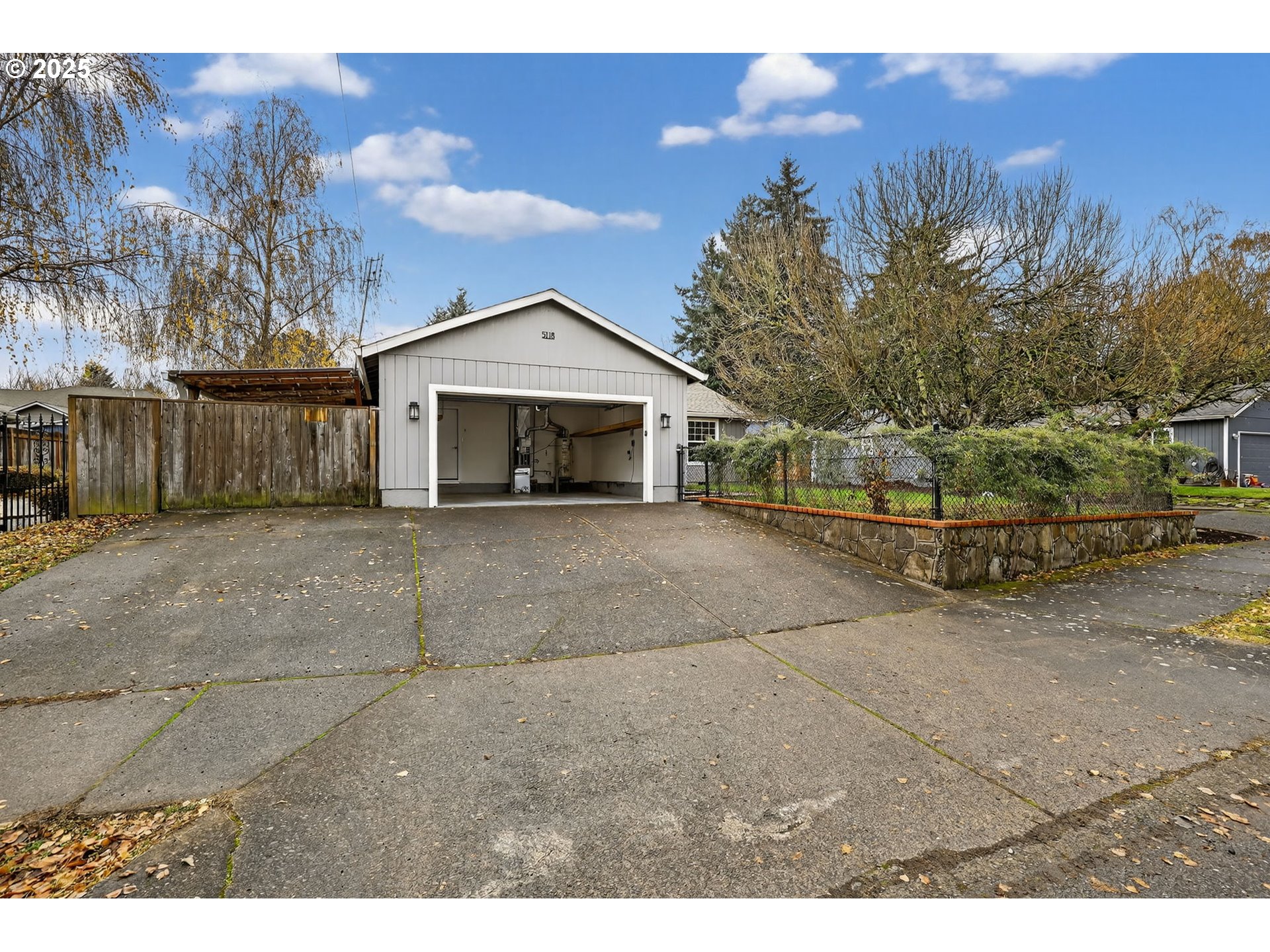 5118 Northeast Jarrett Street Portland, OR 97218 - Photo 46 of 46 a view of a house with a yard