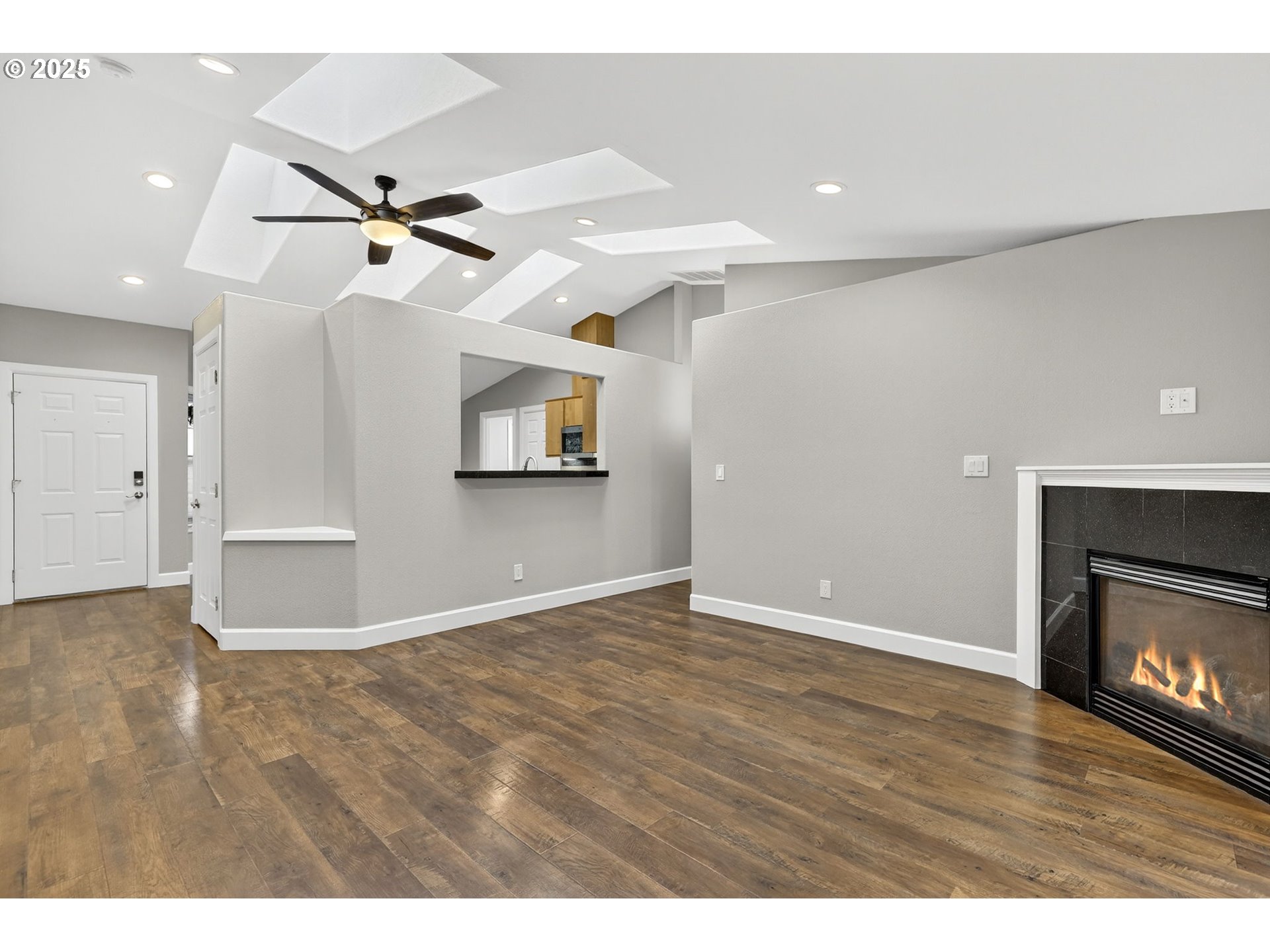 5118 Northeast Jarrett Street Portland, OR 97218 - Photo 6 of 46 a view of an empty room and fire place