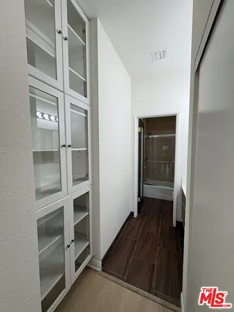 a view of an empty walk in closet
