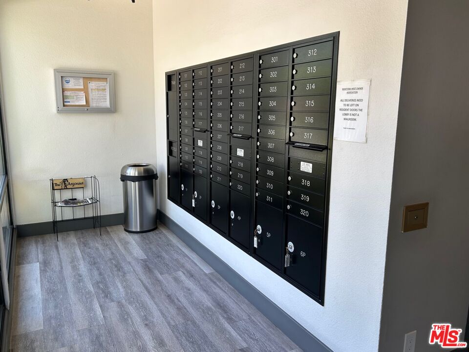 8162 Manitoba Street, Unit 111 Playa del Rey, CA 90293 - Photo 16 of 17 a view of entryway with wooden floor