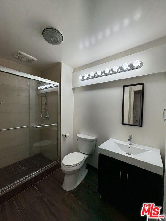 8162 Manitoba Street, Unit 111 Playa del Rey, CA 90293 - Photo 9 of 17 a bathroom with a sink a toilet and shower