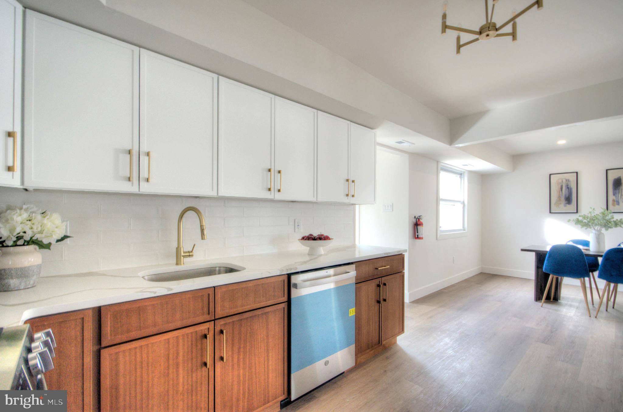 921 North Beecham Road Williamstown, NJ 08094 - Photo 11 of 43 a kitchen with a sink cabinets and window