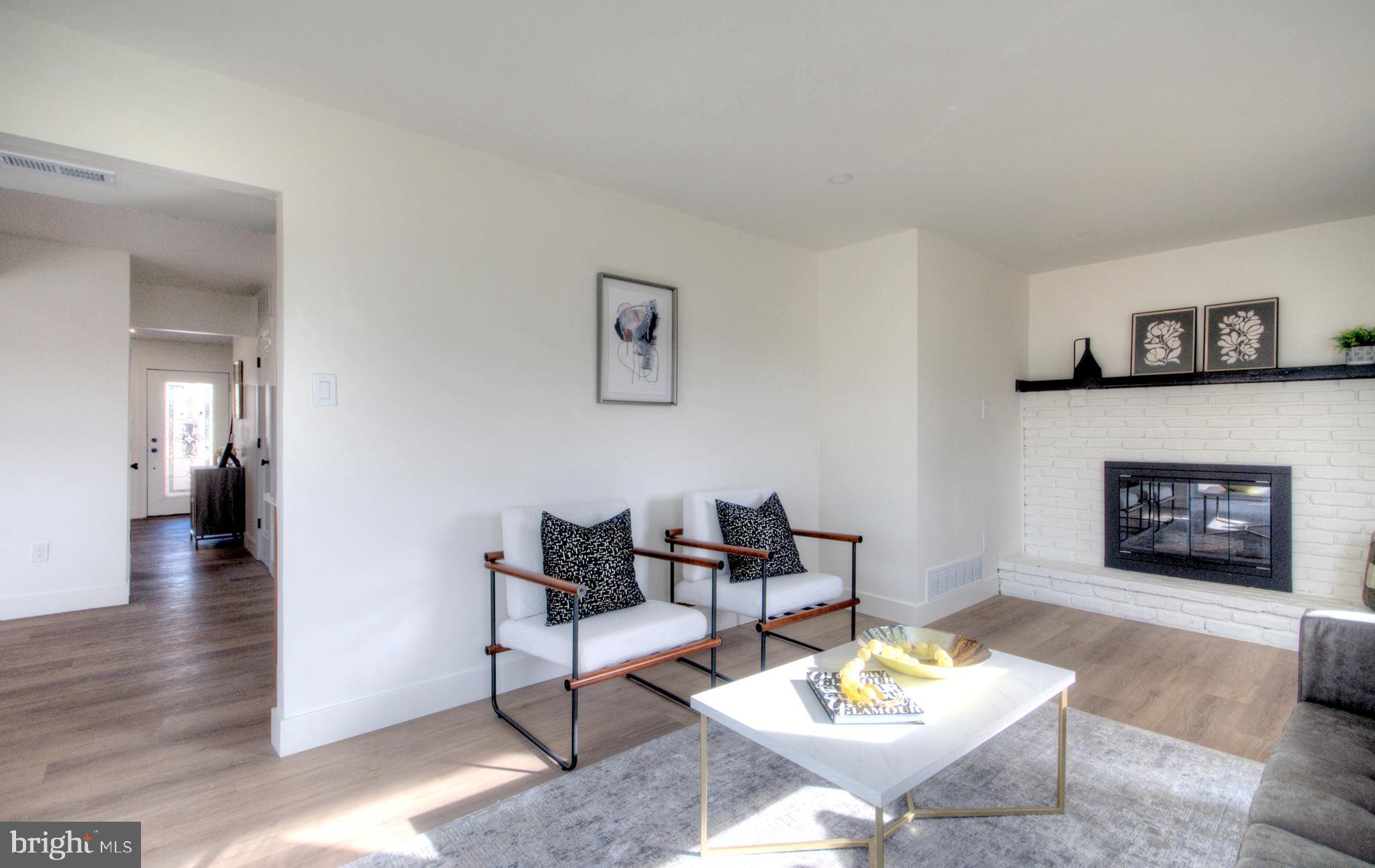 921 North Beecham Road Williamstown, NJ 08094 - Photo 17 of 43 a living room with furniture and a fireplace