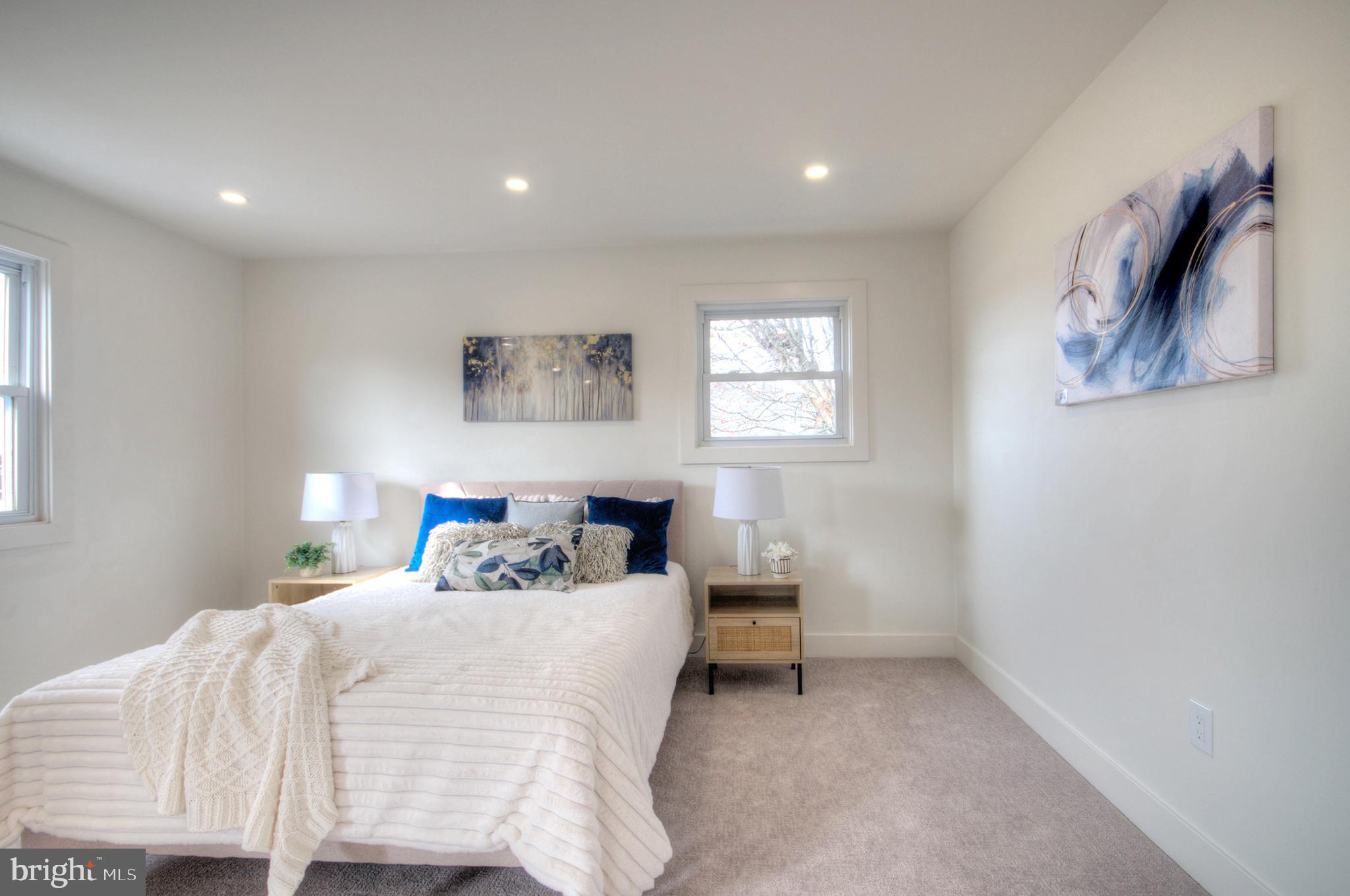 921 North Beecham Road Williamstown, NJ 08094 - Photo 25 of 43 a bedroom with a bed and night stand