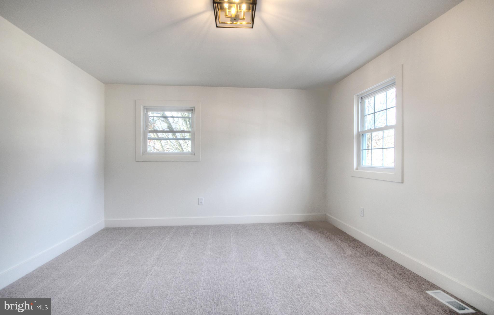 921 North Beecham Road Williamstown, NJ 08094 - Photo 31 of 43 an empty room with windows