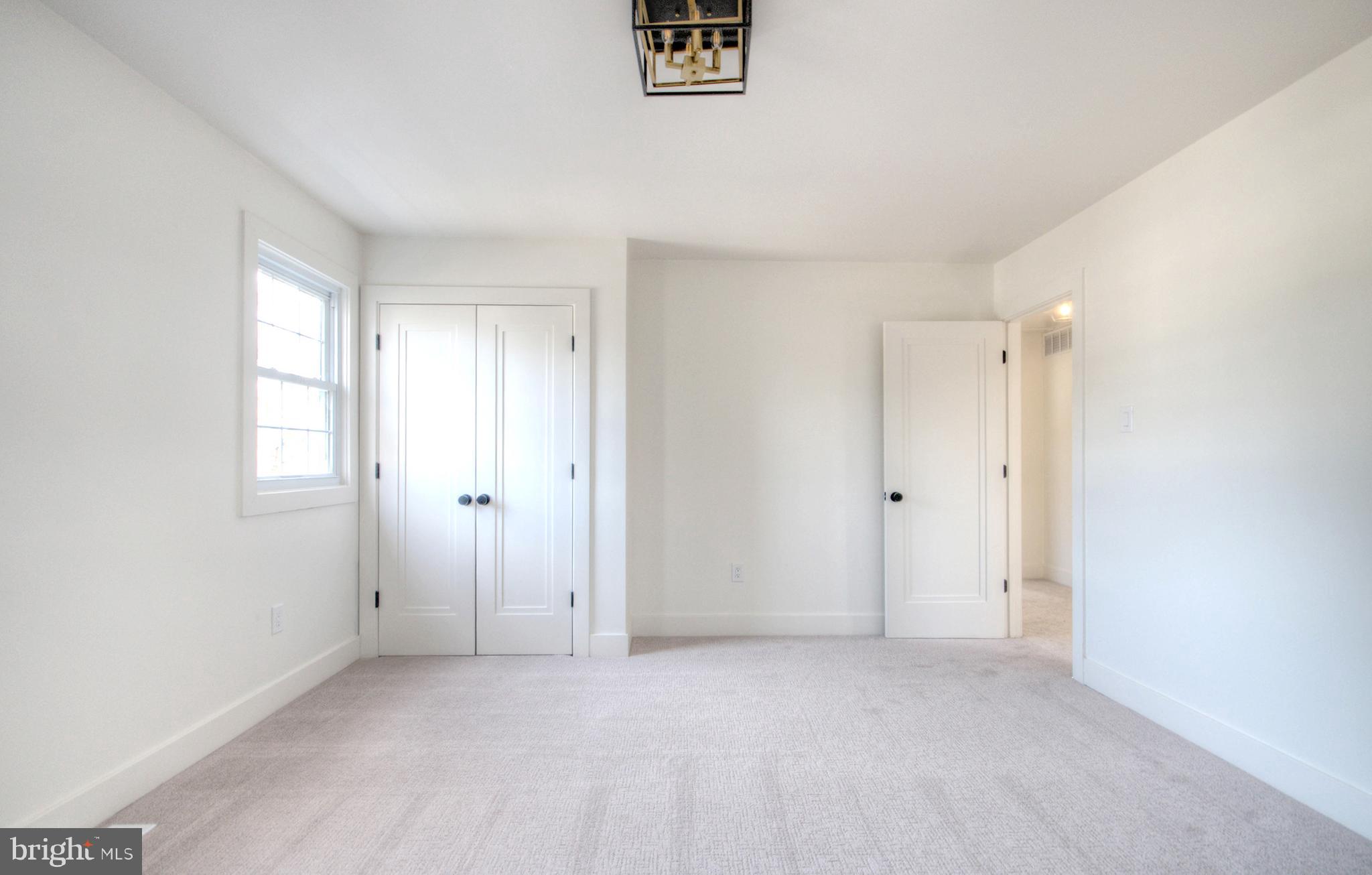 921 North Beecham Road Williamstown, NJ 08094 - Photo 33 of 43 an empty room with windows and closet