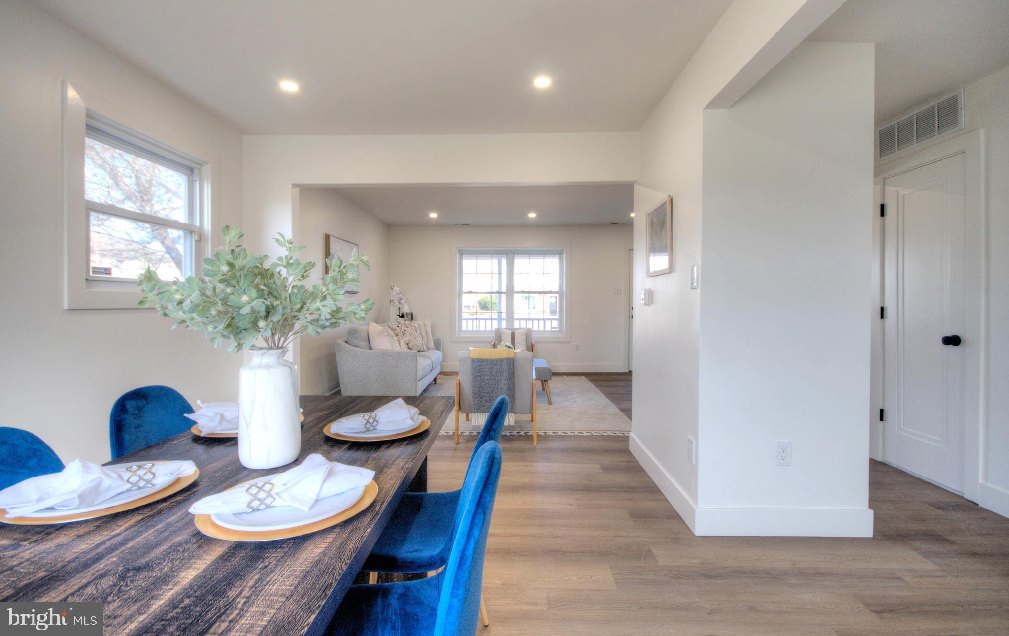 921 North Beecham Road Williamstown, NJ 08094 - Photo 7 of 43 a view of a dining room with furniture and wooden floor