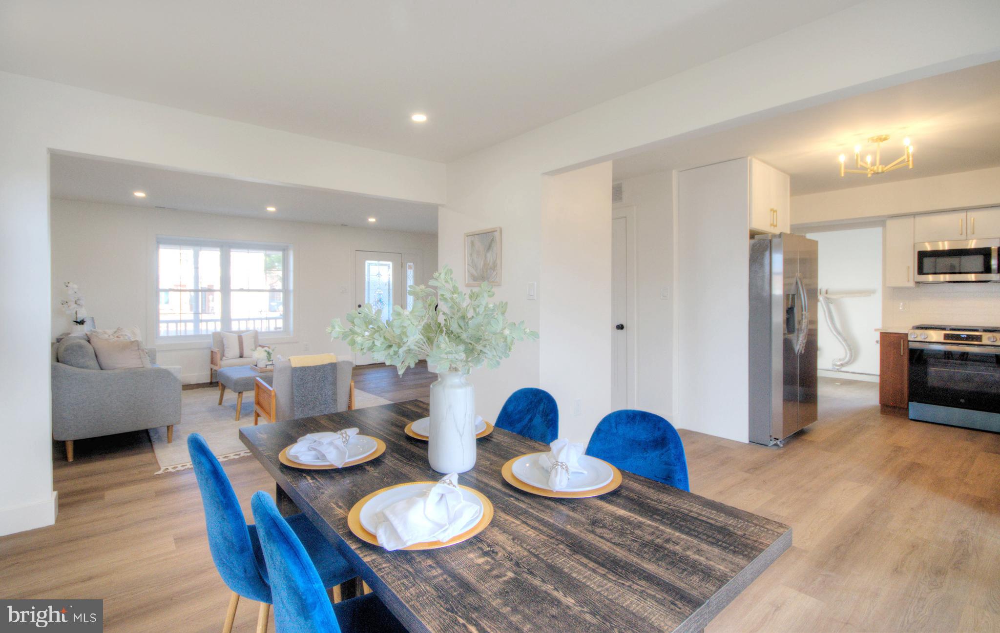 921 North Beecham Road Williamstown, NJ 08094 - Photo 8 of 43 a view of a dining room with furniture and wooden floor