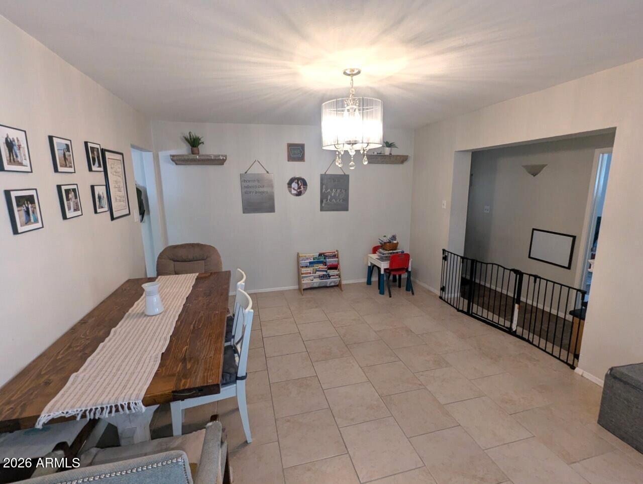 2240 West Berridge Lane Phoenix, AZ 85015 - Photo 8 of 30 a very nice looking dining room with furniture