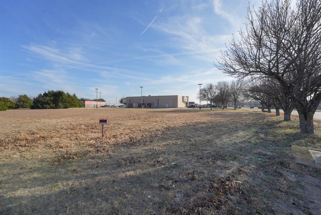 517 East Belt Line Road Cedar Hill, TX 75104 - Photo 6 of 14 a view of a dirt road with large trees