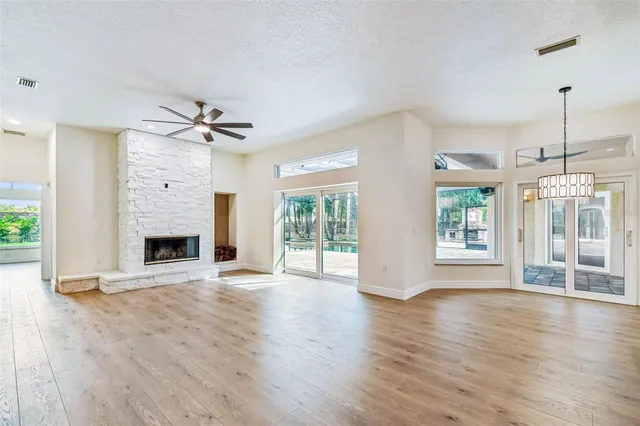 a view of swimming pool with a patio