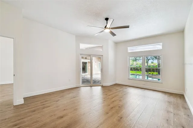a view of a chairs and table in the patio