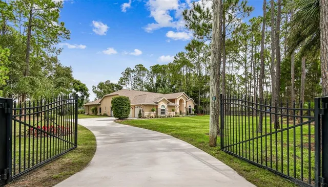 a view of a gate and fence