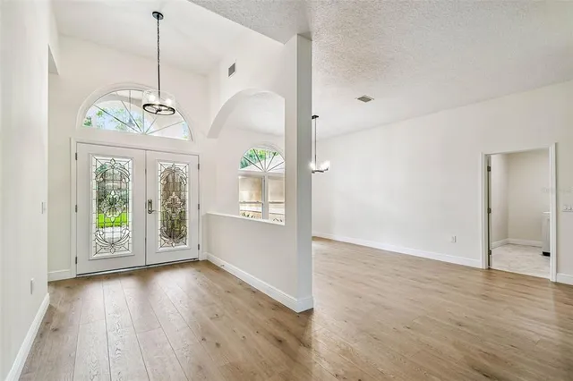 a kitchen with stainless steel appliances granite countertop a stove and a sink