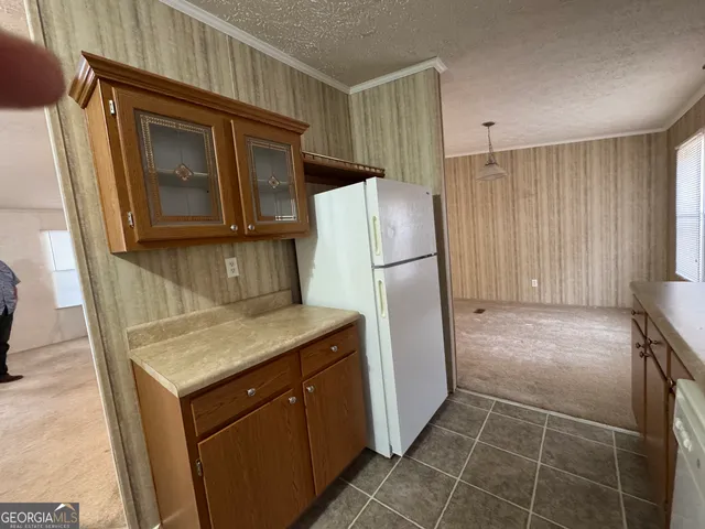 a bathroom with a sink a large mirror and a bathtub