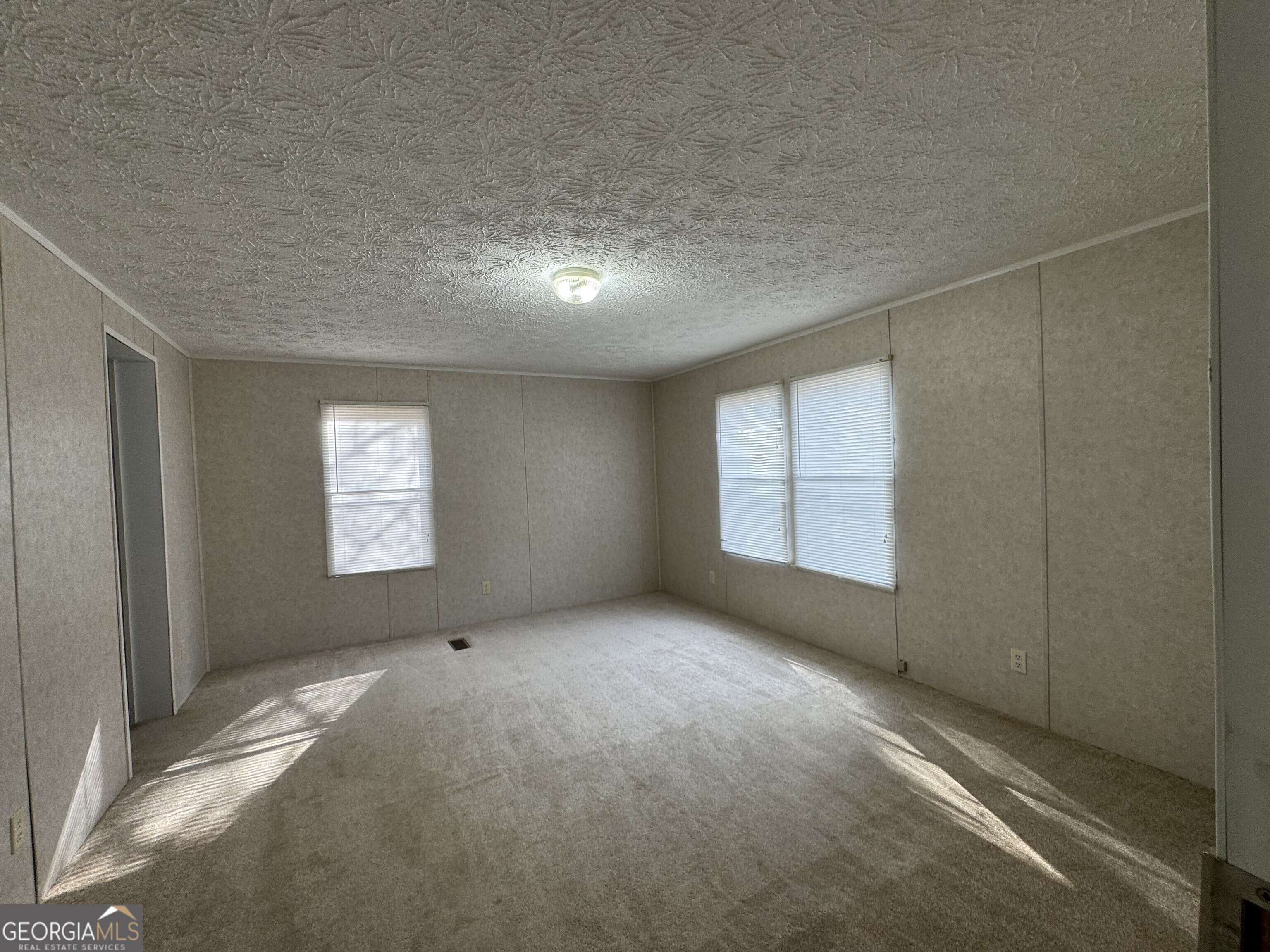 2278 Providence Church Road Lavonia, GA 30553 - Photo 13 of 16 a view of an empty room with a window