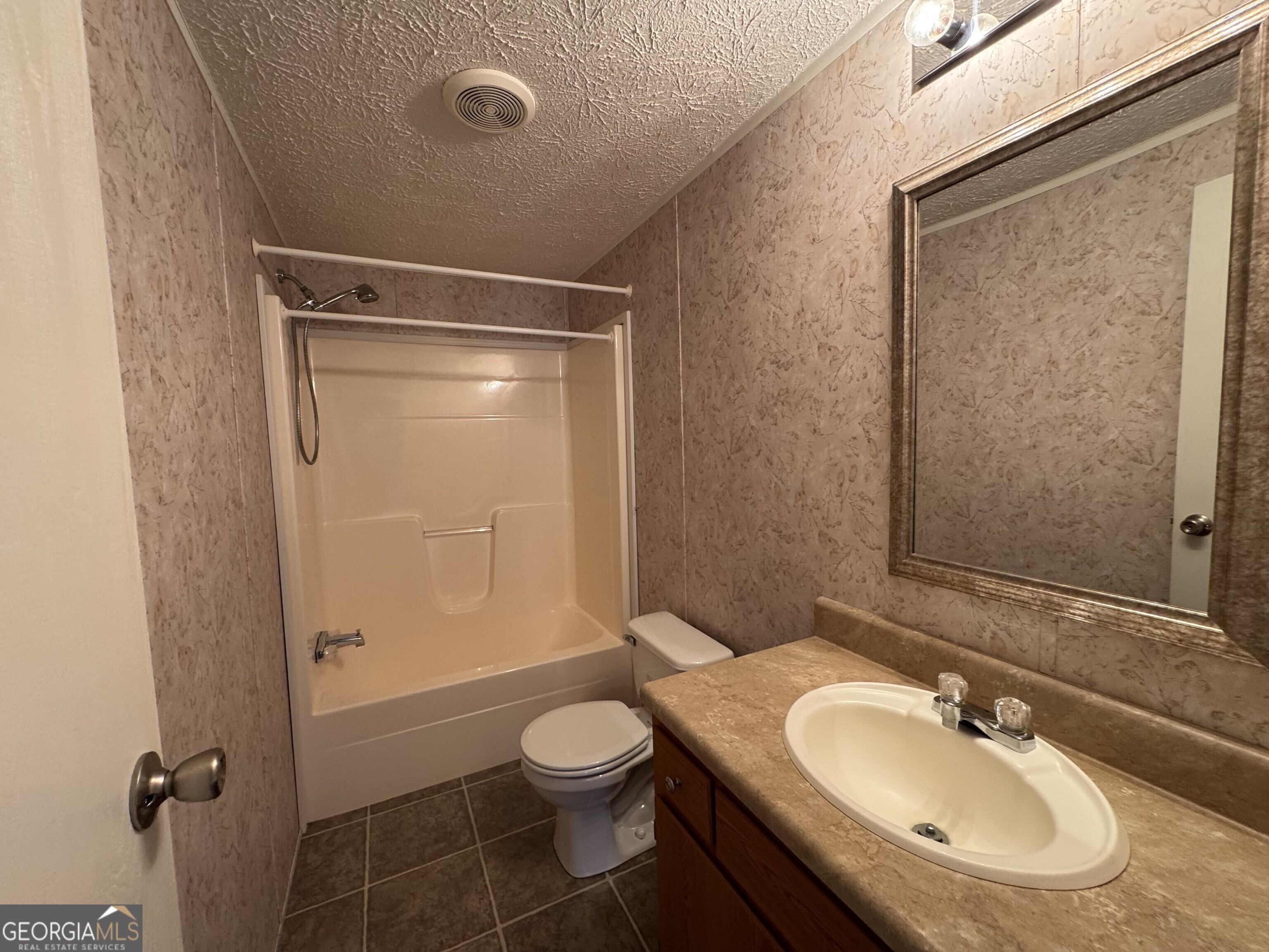 2278 Providence Church Road Lavonia, GA 30553 - Photo 6 of 16 a bathroom with a sink toilet and shower