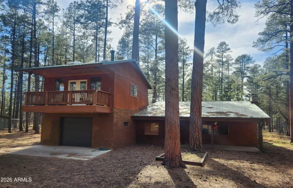 a view of house with outdoor space