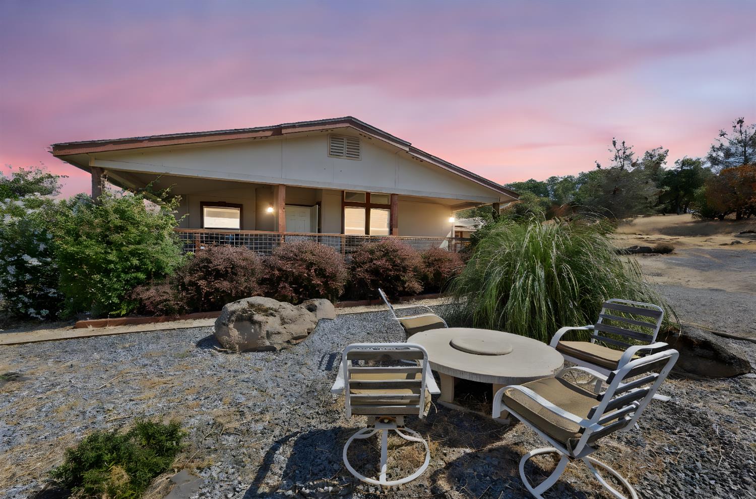 2970 Texas Hill Road Placerville, CA 95667 - Photo 13 of 46 a backyard of a house with table and chairs