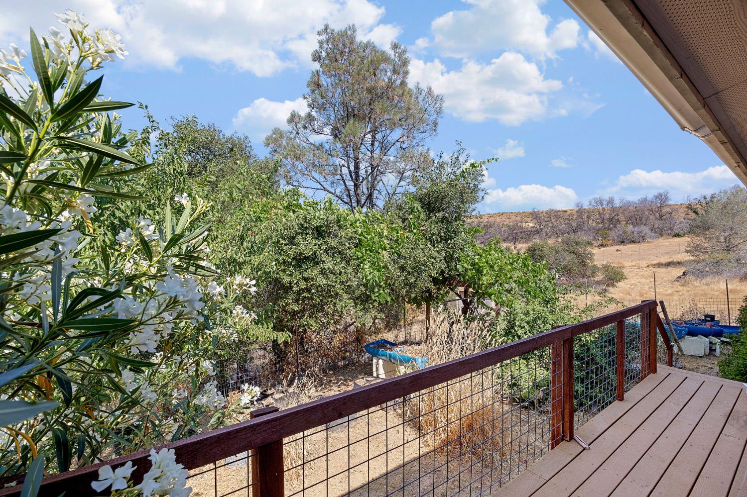 2970 Texas Hill Road Placerville, CA 95667 - Photo 17 of 46 a view of a balcony with wooden fence and floor
