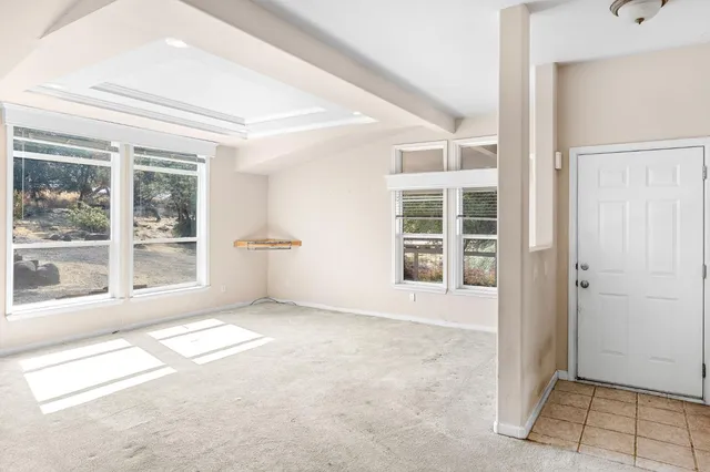 an empty room with windows