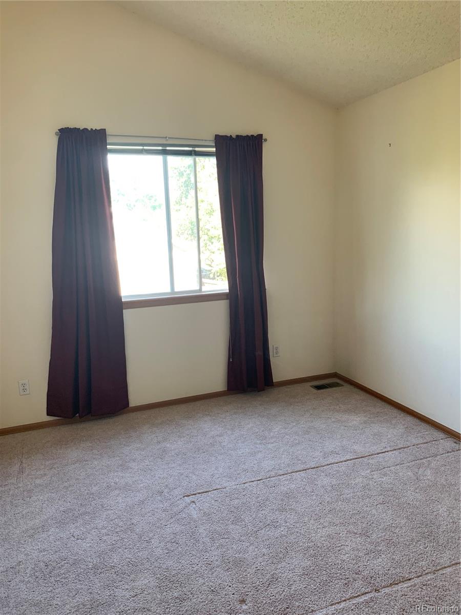 1187 West 133rd Way Westminster, CO 80234 - Photo 7 of 10 an empty room with windows