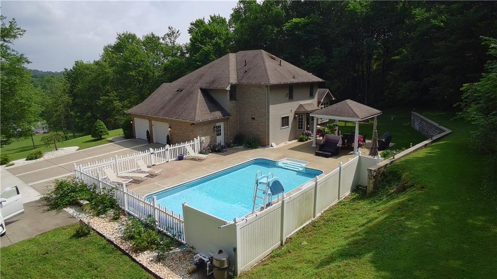 293 Sandy Hill Road Valencia, PA 16059 - Photo 6 of 50 a view of a house with pool and chairs