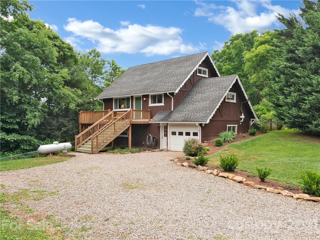 920 Hall Top Road Waynesville, NC 28786 - Photo 1 of 36 front view of a house with a yard