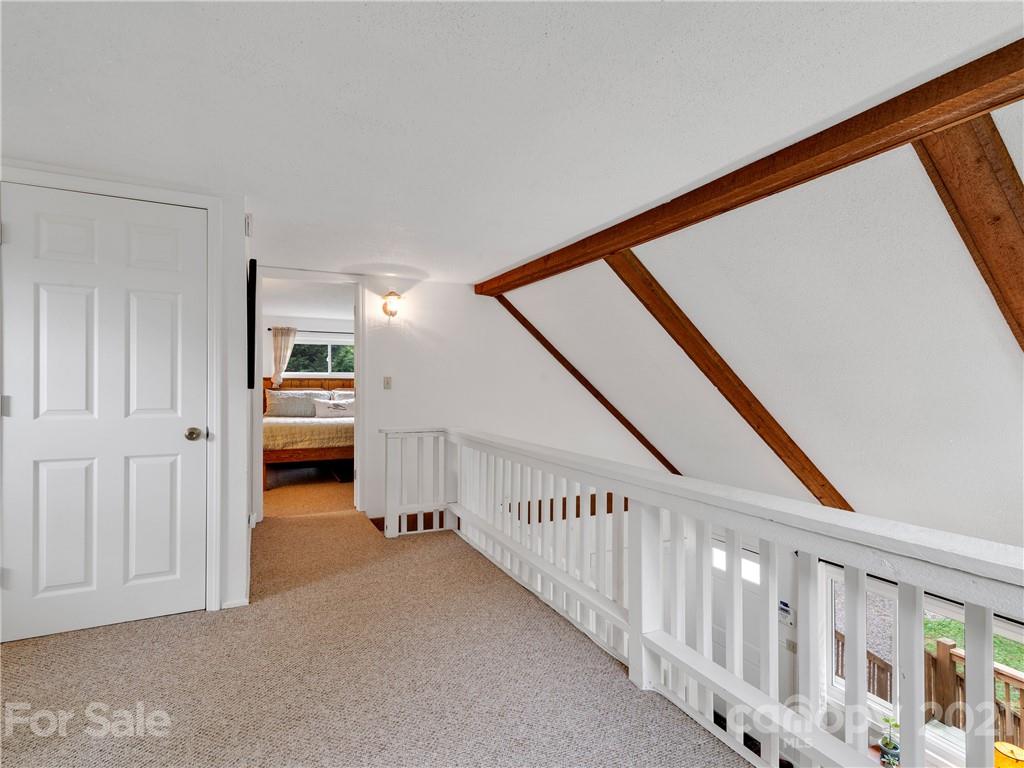 920 Hall Top Road Waynesville, NC 28786 - Photo 20 of 36 a view of a hallway with workspace