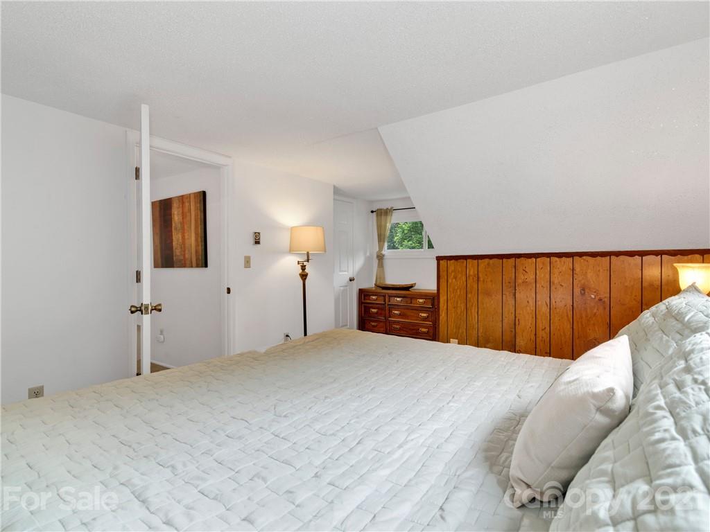 920 Hall Top Road Waynesville, NC 28786 - Photo 23 of 36 a view of an empty room with a window