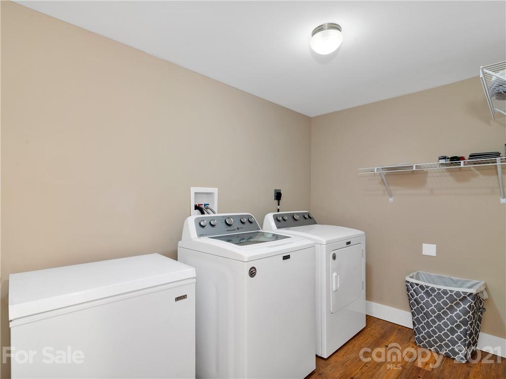 920 Hall Top Road Waynesville, NC 28786 - Photo 29 of 36 a utility room with dryer and washer