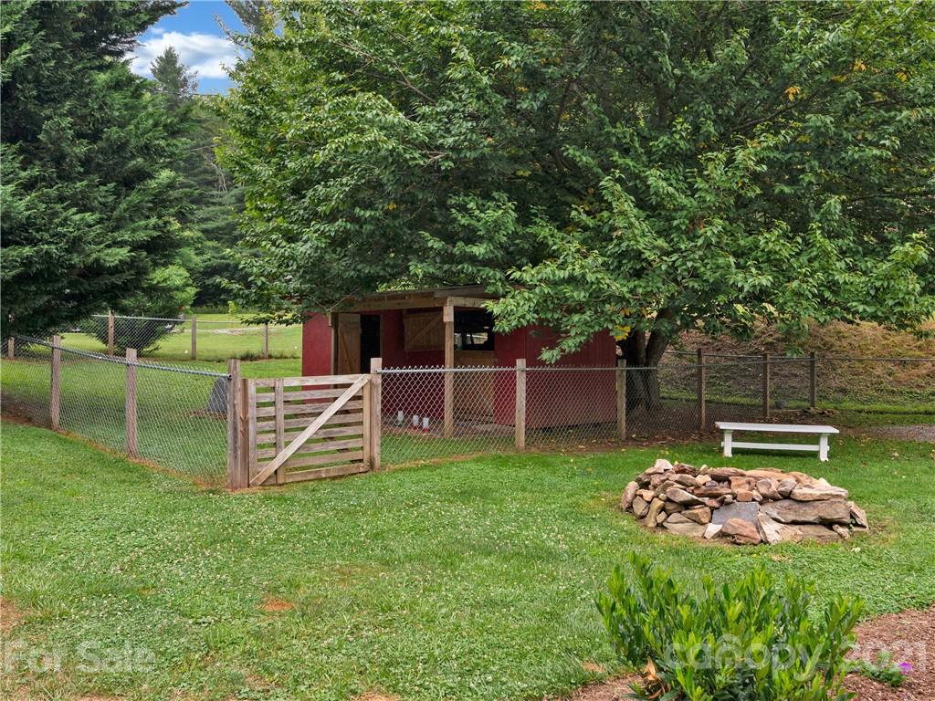 920 Hall Top Road Waynesville, NC 28786 - Photo 34 of 36 a garden view with a seating space