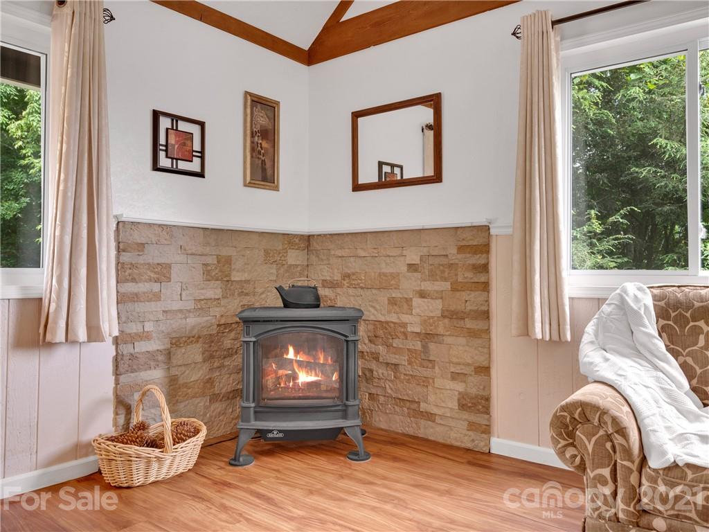 920 Hall Top Road Waynesville, NC 28786 - Photo 8 of 36 a living room with furniture and a fireplace