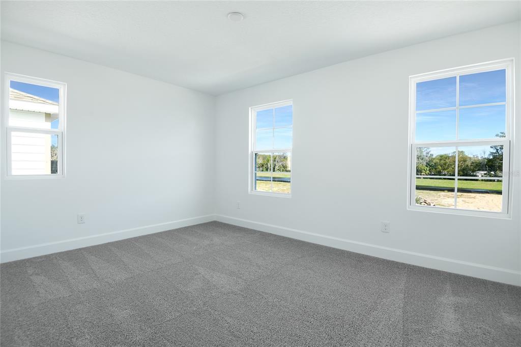 153 Waterstone Loop Tavares, FL 32778 - Photo 16 of 22 an empty room with a window