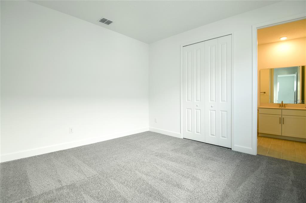 153 Waterstone Loop Tavares, FL 32778 - Photo 4 of 22 a view of empty room