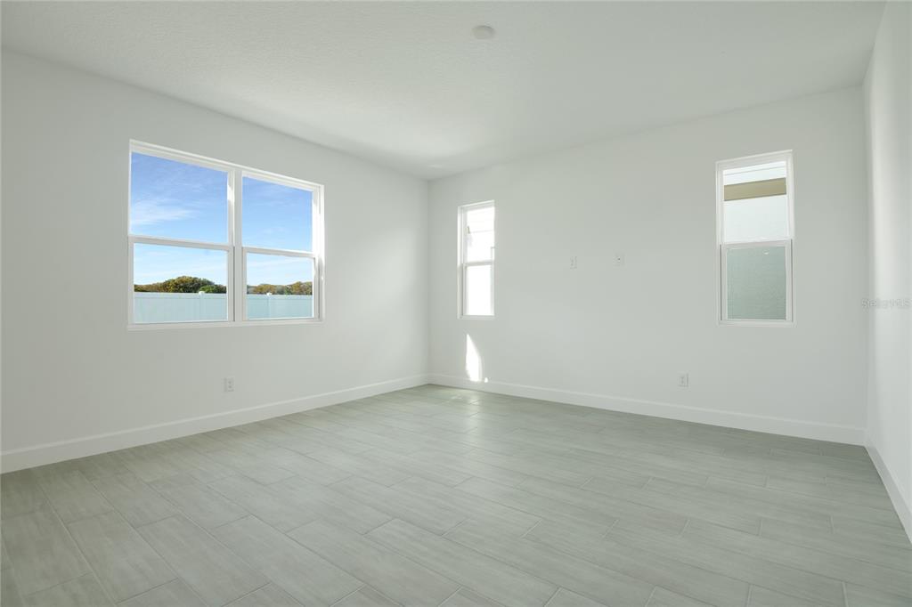 153 Waterstone Loop Tavares, FL 32778 - Photo 9 of 22 an empty room with a window